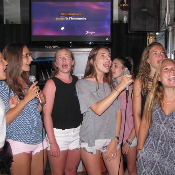 Students singing in karaoke