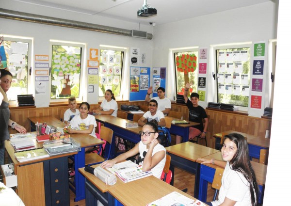 students learning english in classroom