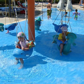 children in the swimming pool in cyprus
