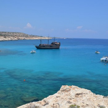 blue sea with boats in cyprus